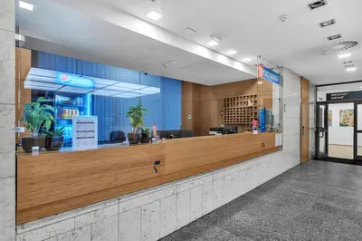 a lobby with a reception counter with at Abitohotel in Prague