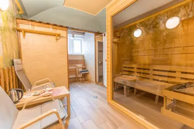 a dining room with a table and a window at Hotel Wilhelm in Prague
