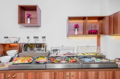 a buffet line with many different types of food at Boutique Hotel Bijou de Prague in Prague