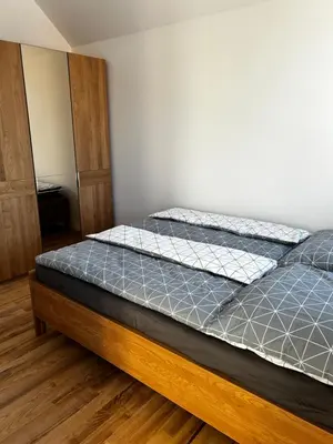 a bedroom with a bed in a room at Palace Resort Jíloviště in Jíloviště