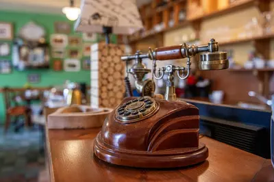 a telephone sitting on top of a counter at Residence Hattrick in Prague