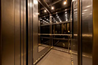 a room with a window with lights on it at Louren Apartments in Prague