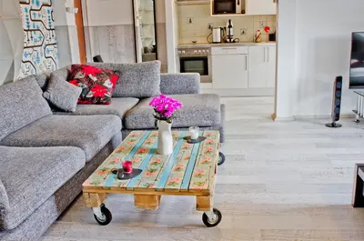 a living room with a couch and a coffee table at Royal Court Legerova in Prague