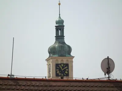 a clock tower on top of a building at Old Town spacious apartment in Prague
