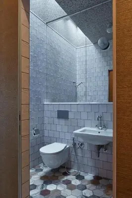 a bathroom with a toilet and a sink at The Emerald in Prague