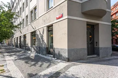 a building on the side of a street at Wishlist Prague Residences - Vinohrady in Prague