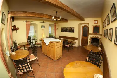 an overhead view of a room with tables and chairs at Pension Centrum in Ricany