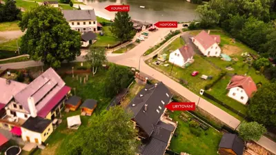 a model of a neighborhood with houses and a street at U mě v domě 26 in Dubá