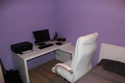 a room with a desk with a computer and a chair at Big Apartment 291 - Rezidence Eliska Prague 9 in Prague