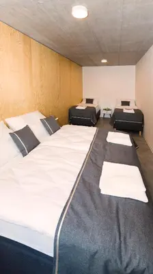 a room with four beds in a room at Residence Trafick in Prague