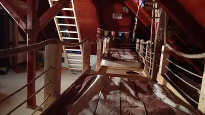 an overhead view of a slide in a room at 14 Century Water Mill in Mořina