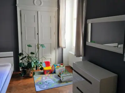 a room with a table with toys on the floor at Apartments Týnská 7 in Prague