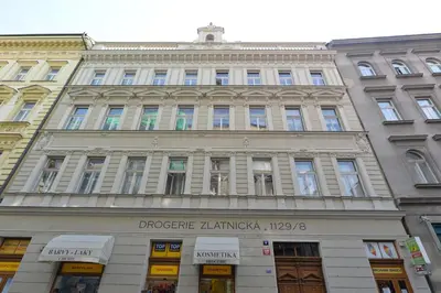 a large building on a city street at Glamour Frida apartment in Prague