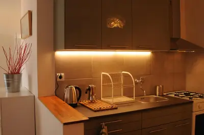 a kitchen with a sink and a counter top at Panorama Prague Castle with Terrace in Prague