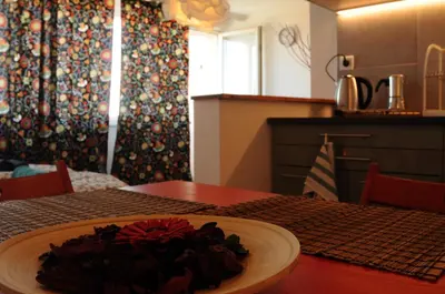 a plate of food on a table in a kitchen at Panorama Prague Castle with Terrace in Prague