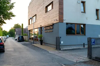 a building on the side of a street at Rezidence & Wellness Blatov in Prague