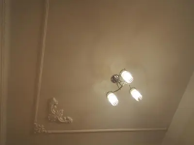a light fixture on the ceiling of a room at Museum Inn in Prague