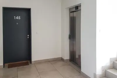 a room with a door with the number on it at ONSITE Free Garage Parking, 10min Centre by Bus in Prague