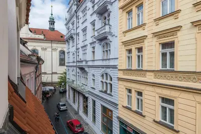 a view of an alley between two buildings at Exclusive Old Town residence near Charles Bridge in Prague