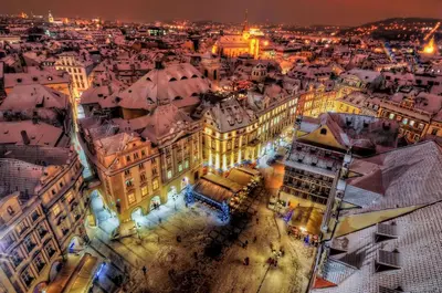an aerial view of a city at night at Prague 1 SUNNY APT with terrace by Michal&Friends in Prague