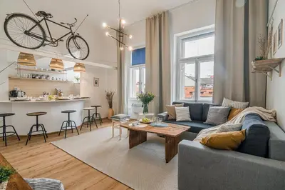 a living room with a couch and a table at Historic Centre Prague Apartments by Michal&Friends in Prague