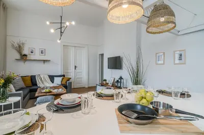 a living room with a table with food on it at Historic Centre Prague Apartments by Michal&Friends in Prague