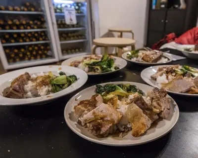a group of plates of food on a table at The MadHouse Prague in Prague