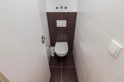 a small bathroom with a toilet in a room at Prague APT near Charles Bridge by Michal&Friends in Prague