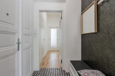 a hallway with a door leading into a room at Zizkov APT Prague by Michal&Friends in Prague