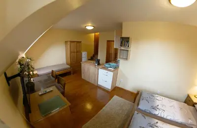 an overhead view of a living room with a staircase at Stary dum in Černošice