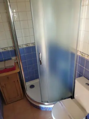 a bathroom with a shower with a toilet and a sink at U Anny Šmejdířky in Nymburk