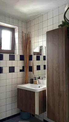 a bathroom with a sink and a mirror at U Anny Šmejdířky in Nymburk