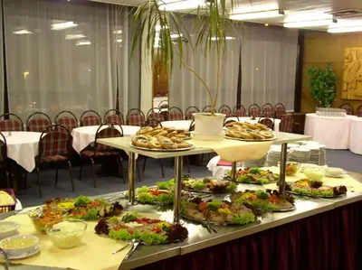 a buffet line with many different types of food at Hotel Krystal in Prague