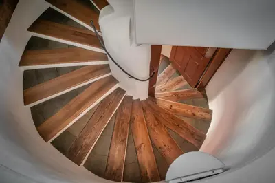 an overhead view of a wooden ceiling with a lamp at 3 Epoques Apartments by Adrez in Prague