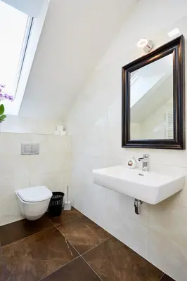 a bathroom with a sink and a toilet at Bílichov in Bílichov