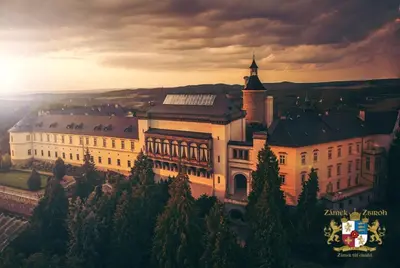a large building with a tower on top of it at Chateau Zbiroh in Zbiroh