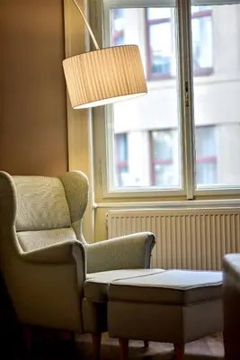 a living room with two chairs and a lamp at ✰DOWNTOWN GRAND APARTMENT - Old Town TOP Location✰ in Prague