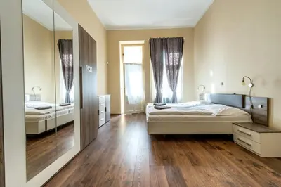 a bedroom with a bed and a mirror at ✰DOWNTOWN GRAND APARTMENT - Old Town TOP Location✰ in Prague