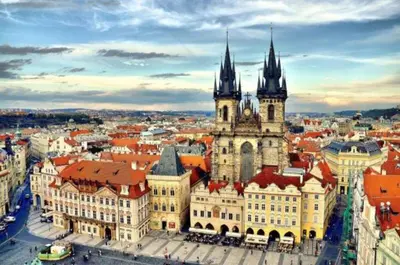 an aerial view of a city with a castle at Prague city centre in Prague