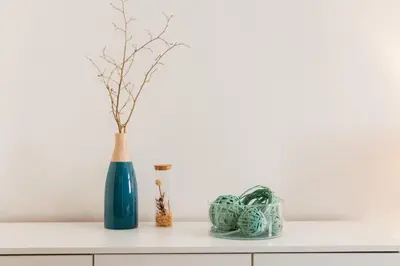 a blue vase sitting on top of a counter at Stay Inn Apartments Naplavka in Prague