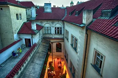 an overhead view of a building with red roofs at Karlova 25 Apartments in Prague
