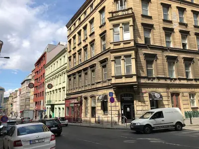 a white van parked in front of a building at Apartment Happy 11 in Prague