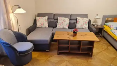 a living room with a couch and a coffee table at Apartment No 0A Anenska 13 - Stare Mesto in Prague