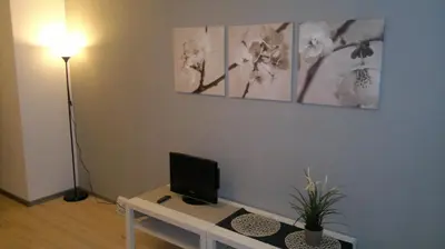 a room with a desk with a computer on it at Hotel Terek in Štětí