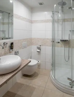 a bathroom with a sink and a toilet and a shower at Aurus by Adrez in Prague