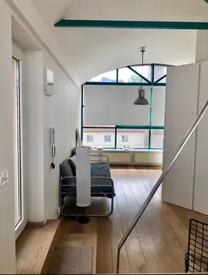 a hospital room with a bed and a window at Romantic studio with jacuzzi in Prague