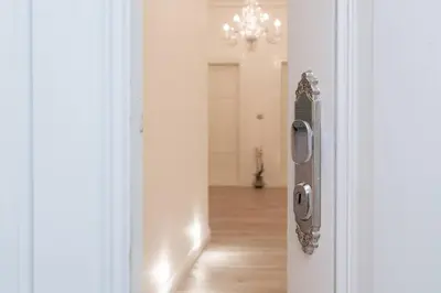 an open door with a view of a hallway at Arch II at Wenceslas in Prague