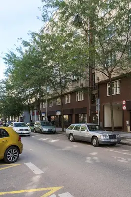 a group of cars parked on the side of a street at Cozy studio with parking near city center in Prague
