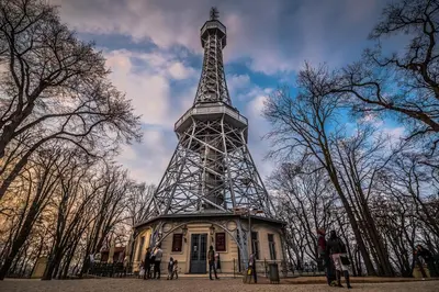 a tower with people standing in front of it at Apartment Vltava Prague in Prague