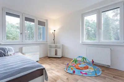 a bedroom with a bed and a toy in the middle at Villa Lhota in Lhota